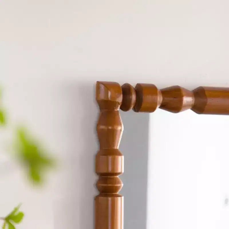 Miroir mural vintage en bois sculpté avec cadre à colonnes pour salon ou entrée